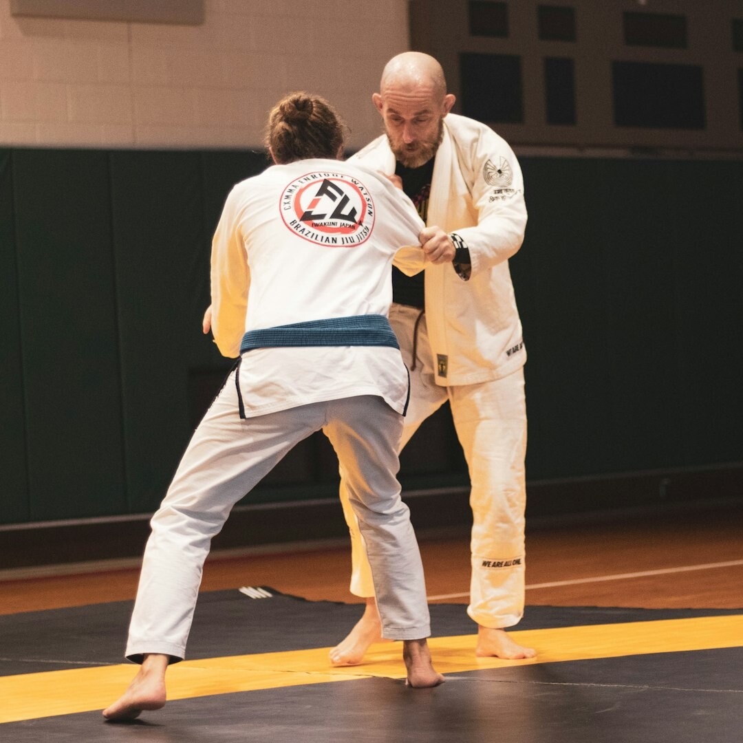 Instructor giving a thumbs up with trainees in a live studio